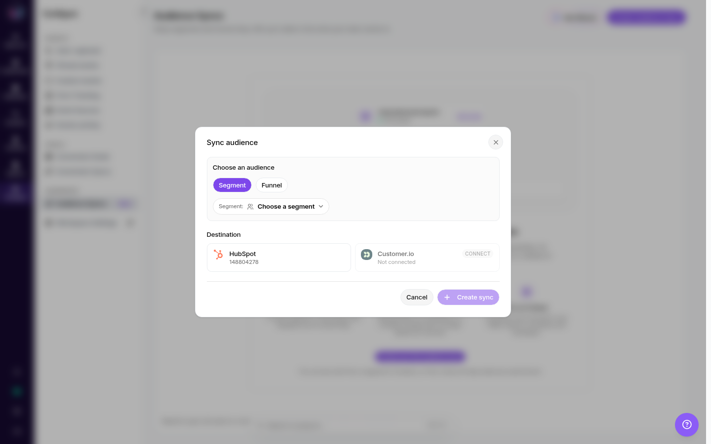 Sync audience modal in the Usermaven workspace showing HubSpot (148804278) as a connected destination, and Customer.io as not connected